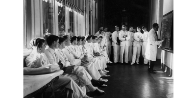 Dr Frank Forster and students