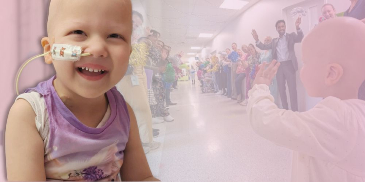 In the foreground, a young child with a nasal tube smiles warmly. In the background, a faded overlay shows the child walking down a hospital
